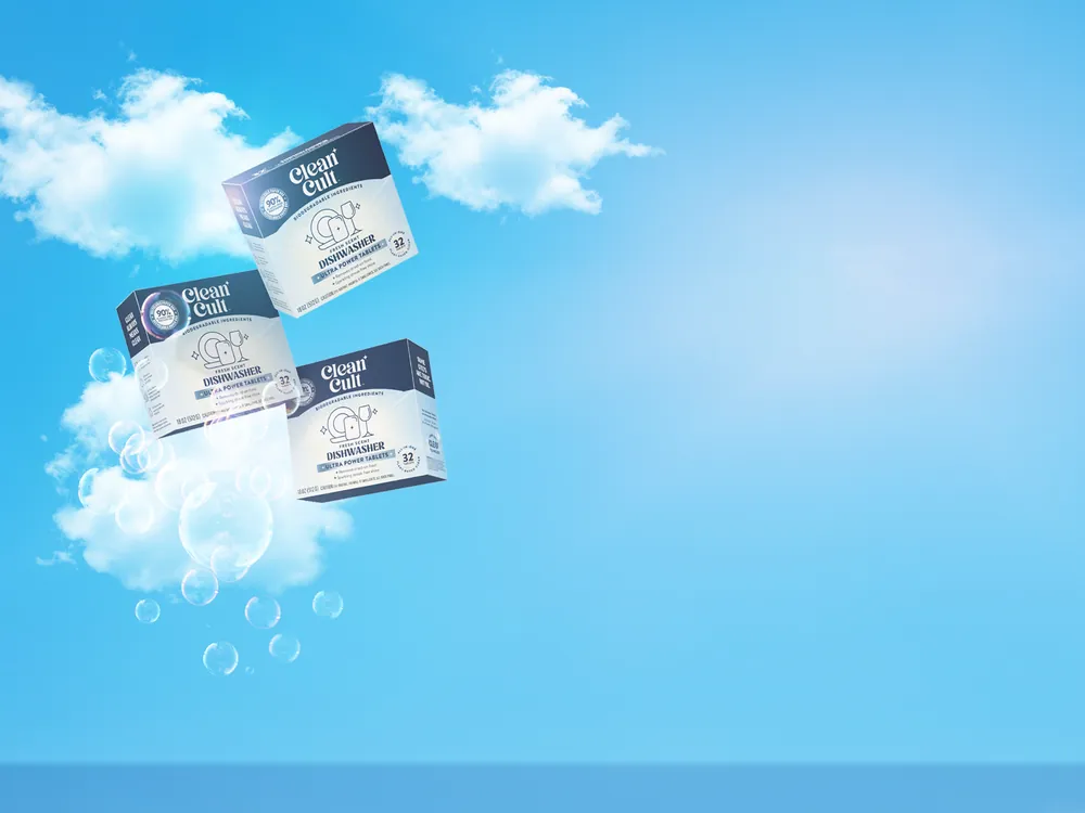 Boxes of dishwasher tablets floating among clouds